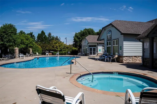 a view of a house with swimming pool