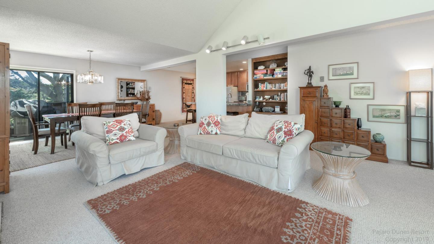 101 Shell Road, Unit 102 Watsonville, CA 95076 - Photo 3 of 20 a living room with furniture and a rug
