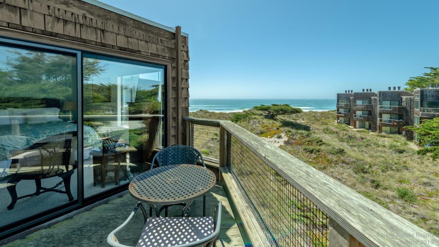 101 Shell Road, Unit 102 Watsonville, CA 95076 - Photo 5 of 20 a view of a balcony with chair and table