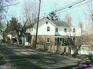 2898 River Road New Hope, PA 18938 - Photo 1 of 1 a front view of a house with a yard