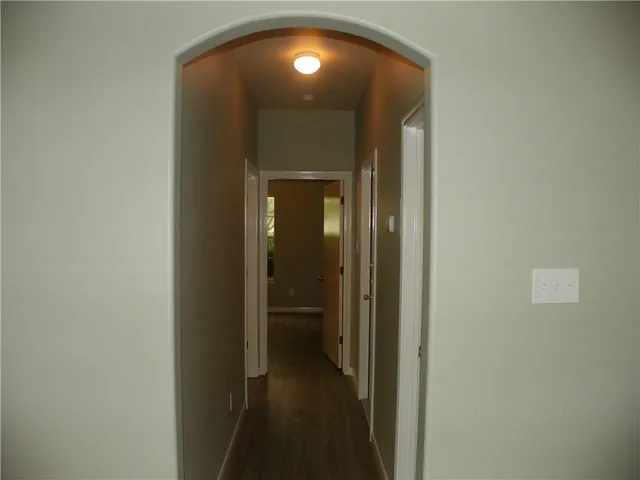 a view of a livingroom from a hallway