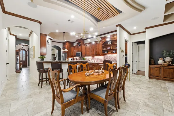 a view of a dining room with furniture