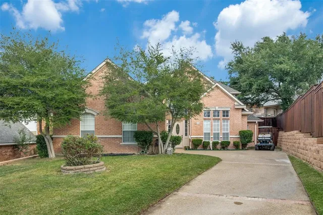 a house view with a garden space