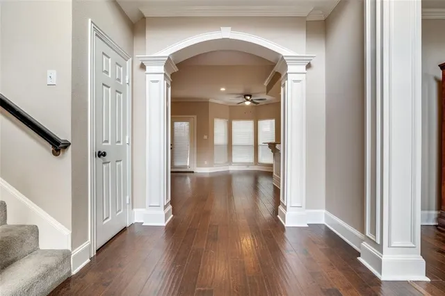 a view of gallery with wooden floor