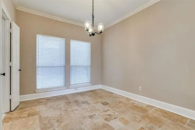 en empty room with windows