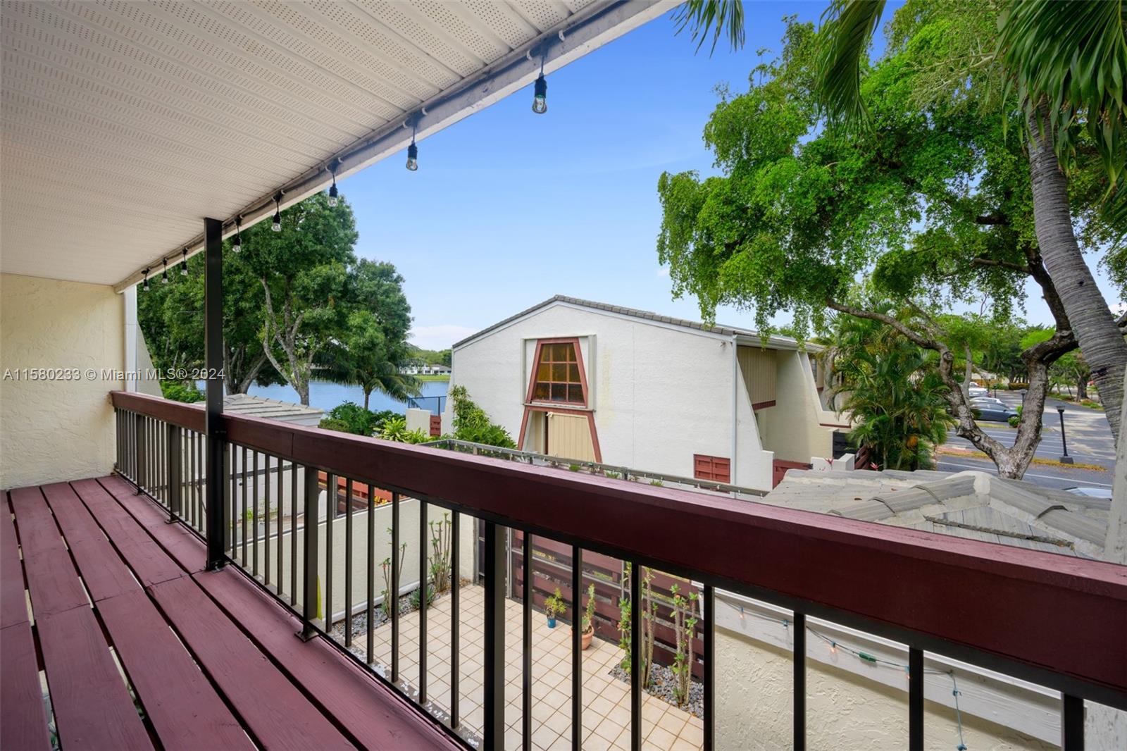 Emerald Hills Hollywood, FL 33021 - Photo 15 of 25 a view of a wooden deck and a backyard