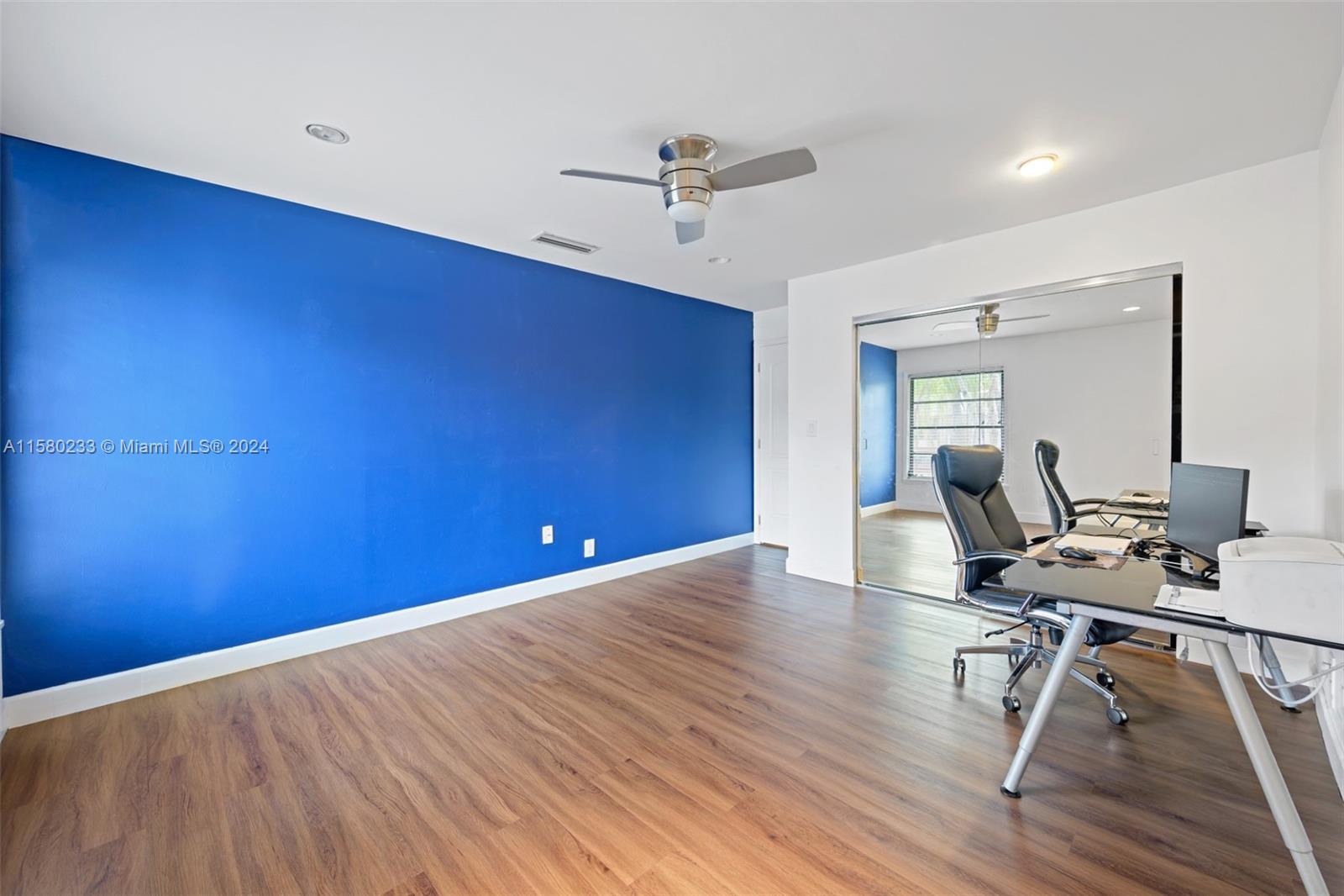 Emerald Hills Hollywood, FL 33021 - Photo 16 of 25 a view of workspace with wooden floor