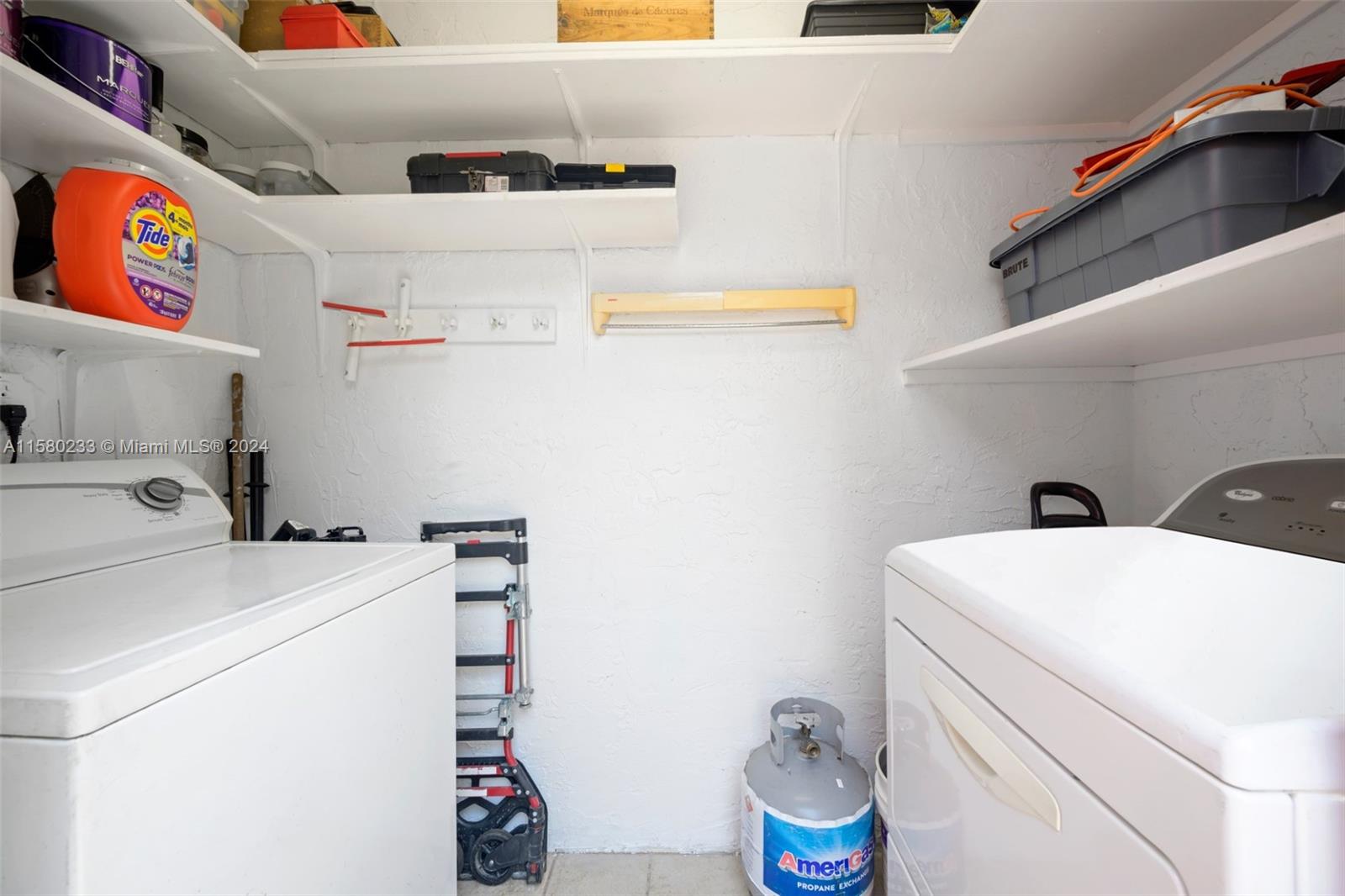 Emerald Hills Hollywood, FL 33021 - Photo 22 of 25 a utility room with dryer and washer