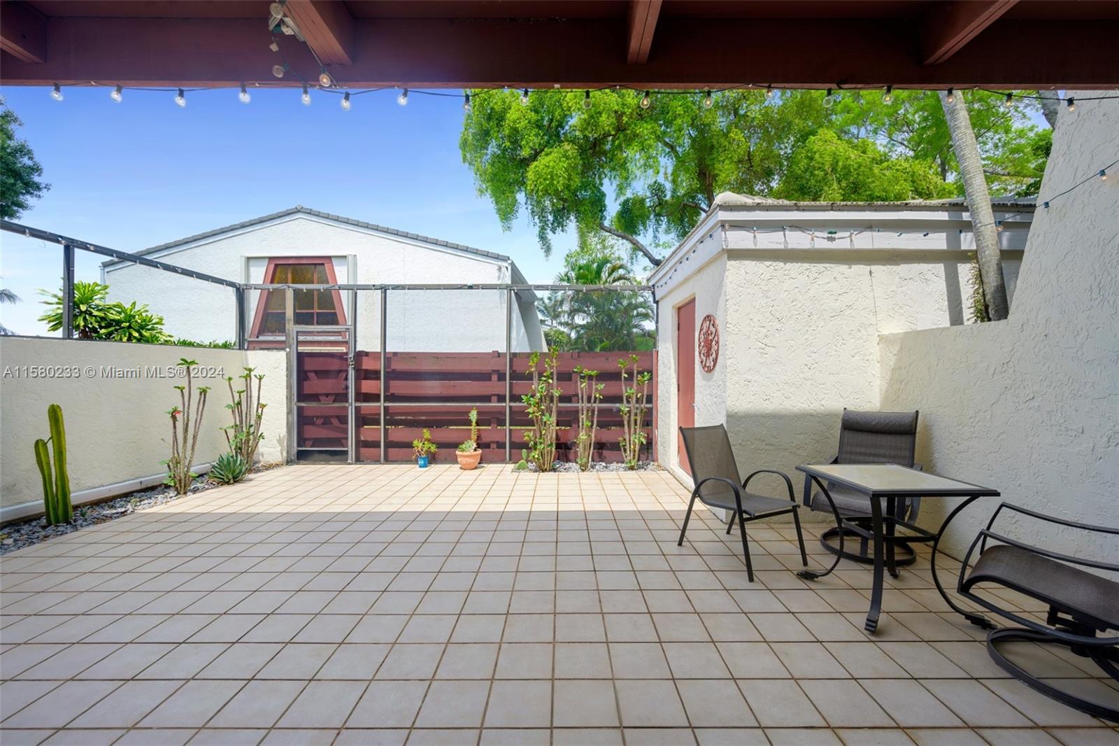 Emerald Hills Hollywood, FL 33021 - Photo 24 of 25 a house view with a seating space