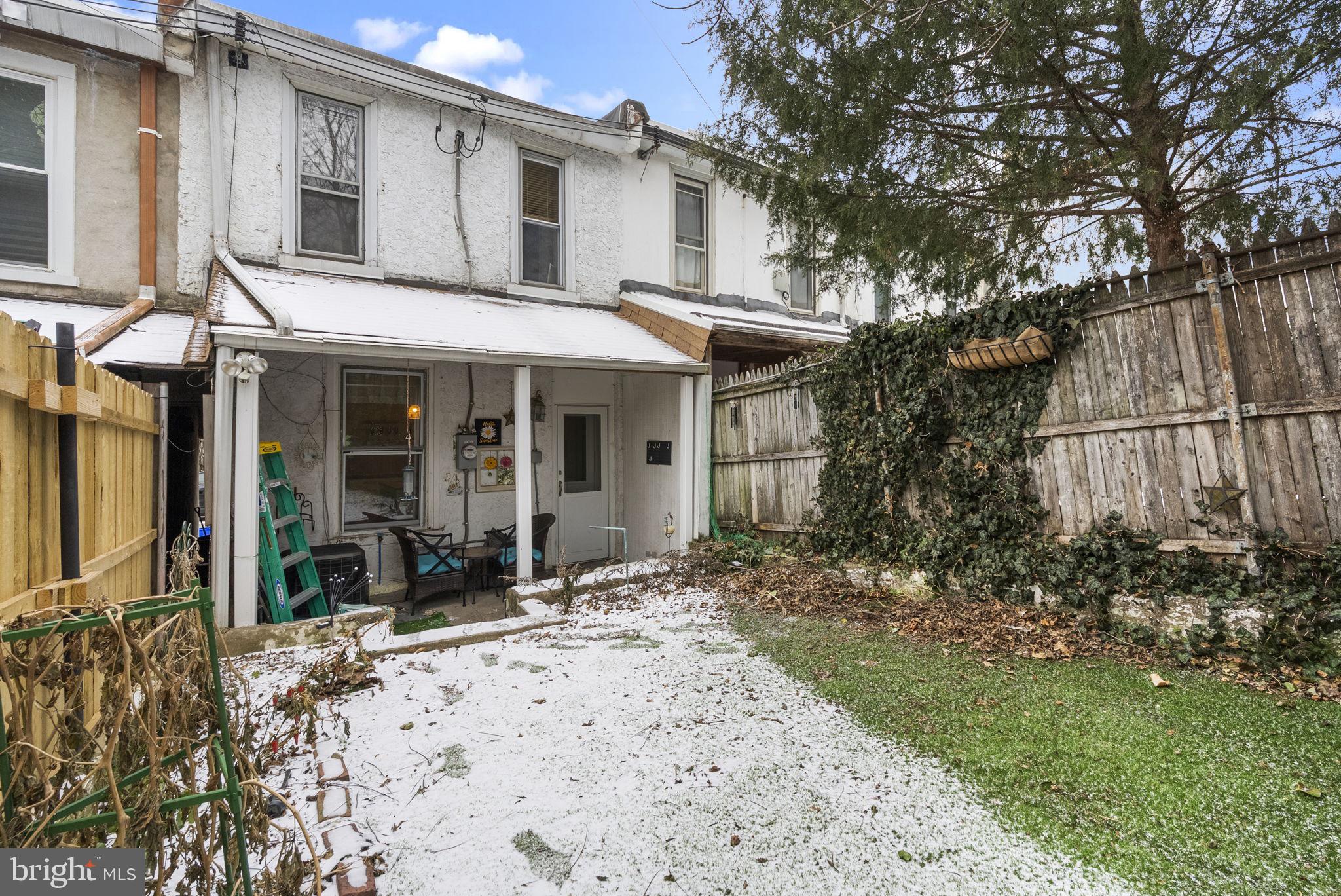 4349 Terrace Street Philadelphia, PA 19128 - Photo 24 of 25 a view of a house with a yard and sitting area