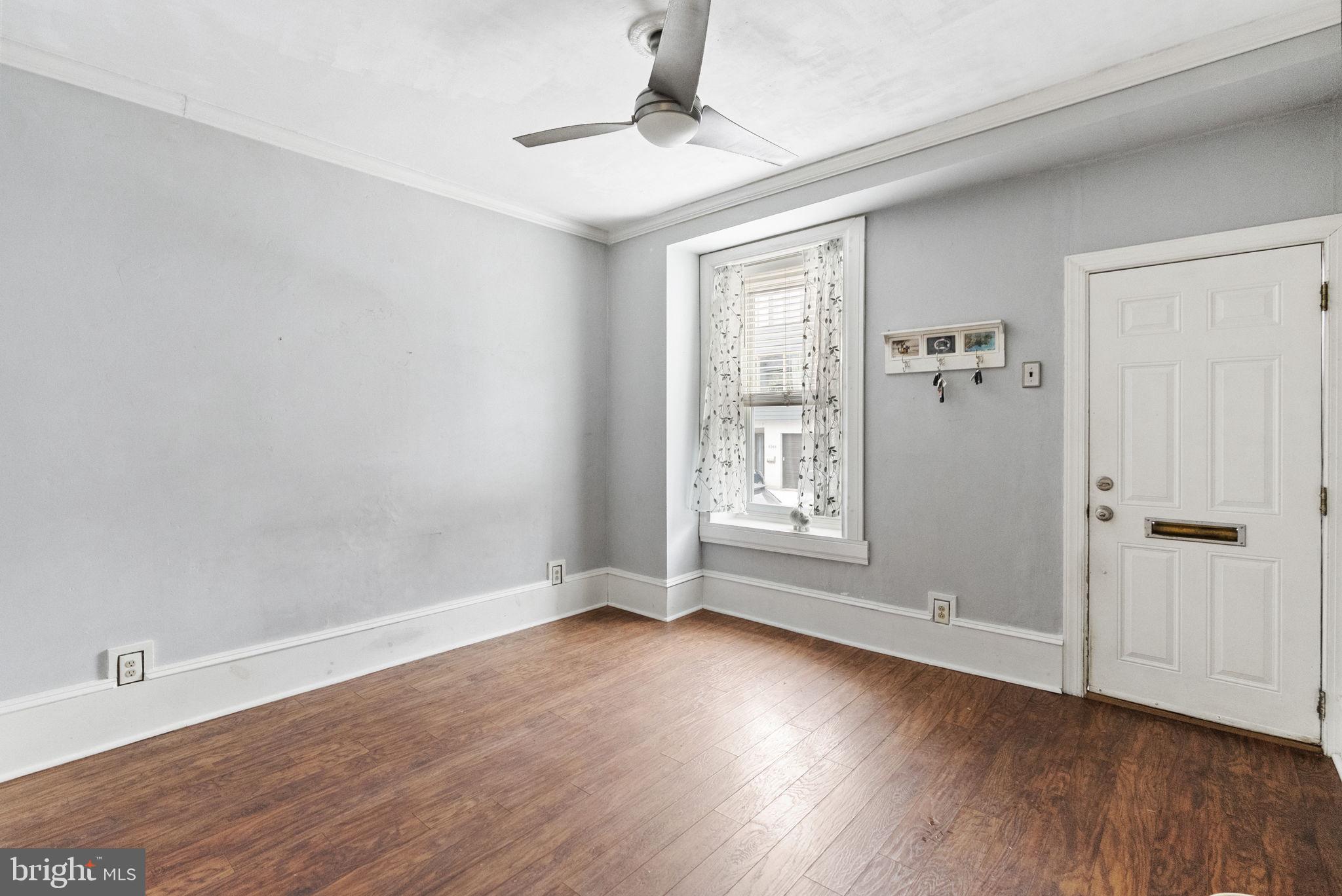 4349 Terrace Street Philadelphia, PA 19128 - Photo 7 of 25 wooden floor in an empty room with a window