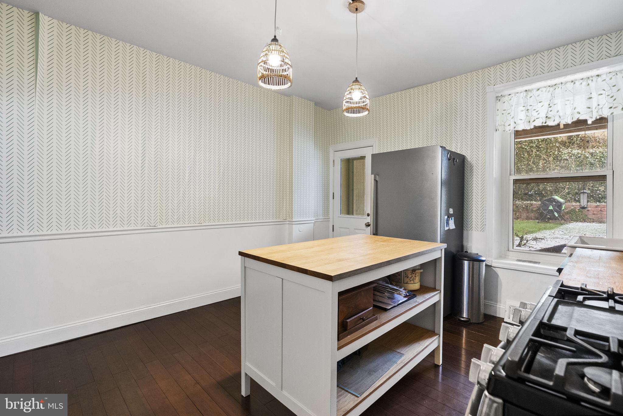 4349 Terrace Street Philadelphia, PA 19128 - Photo 10 of 25 a kitchen that has a stove and a refrigerator