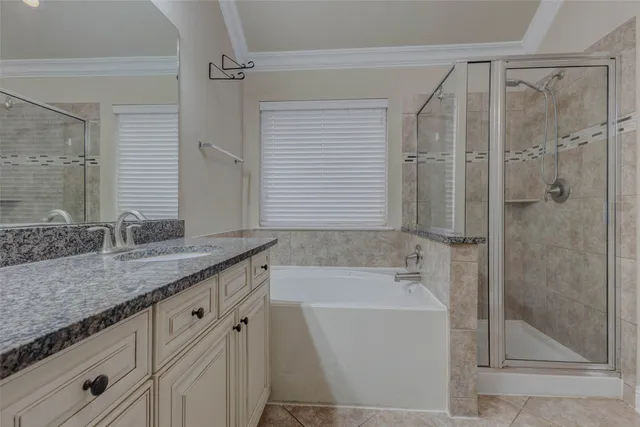 a view of a hallway with wooden floor and entryway