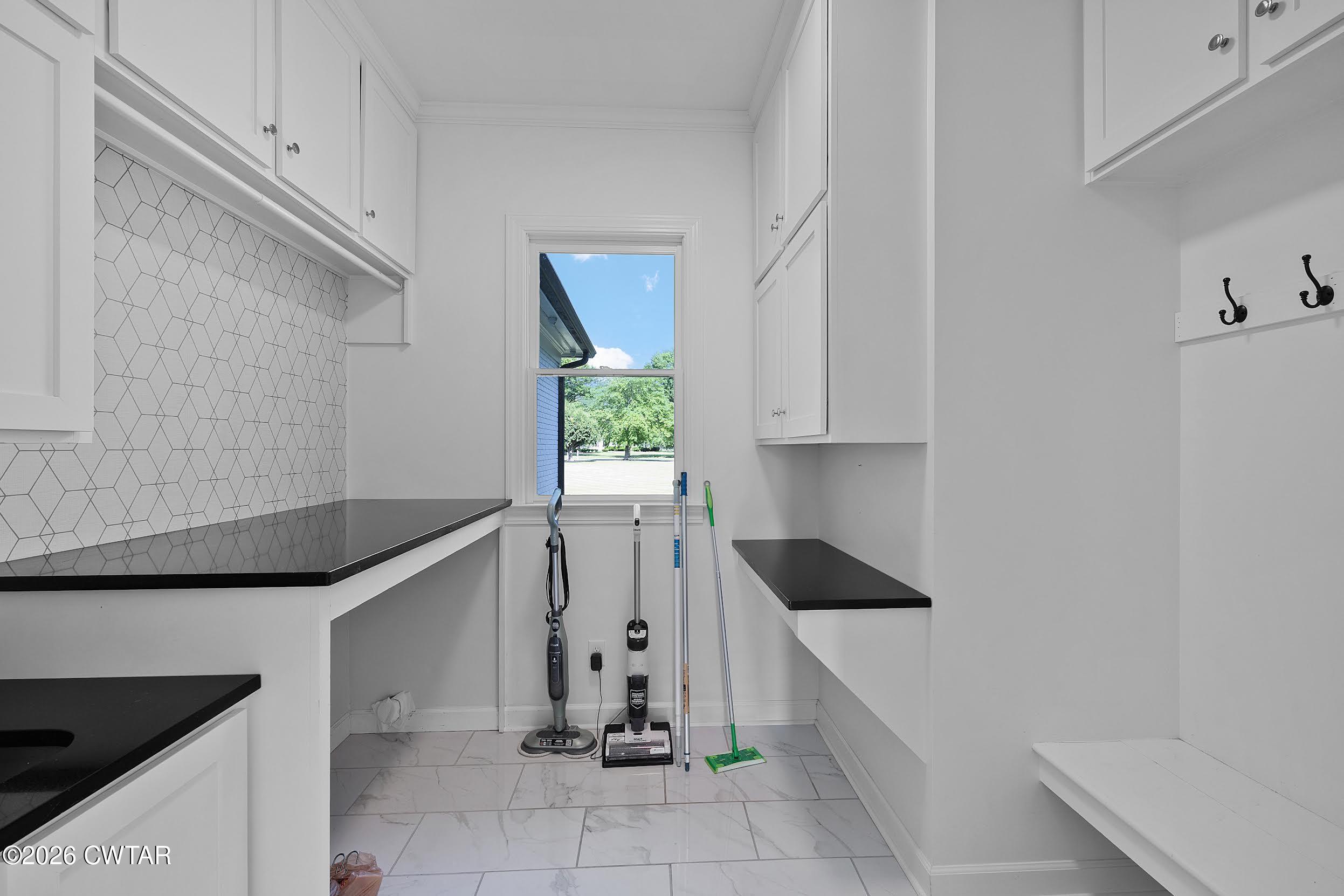 58 Huntington Place Jackson, TN 38305 - Photo 25 of 38 a kitchen with a refrigerator and window