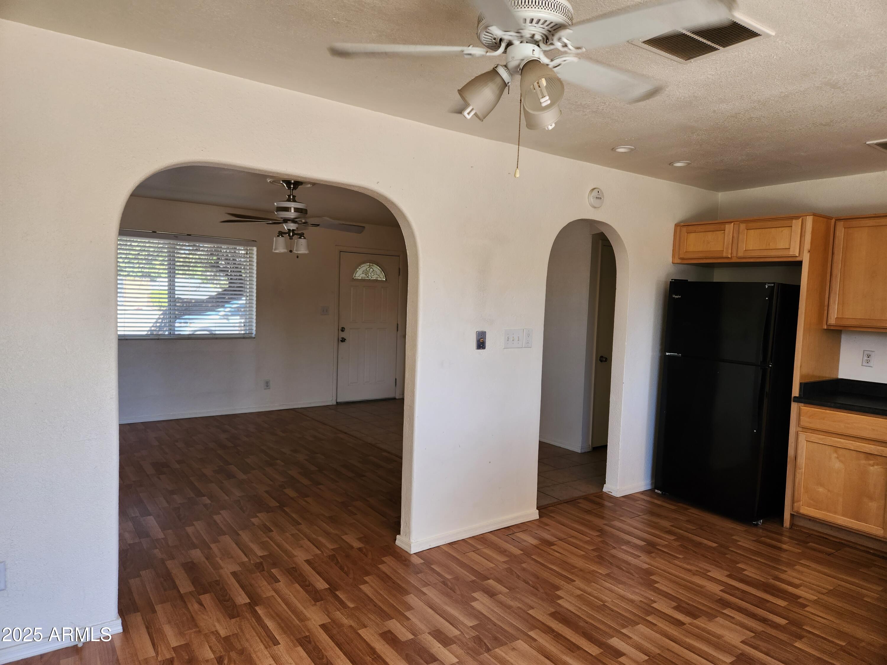 1803 West Kerry Lane Phoenix, AZ 85027 - Photo 5 of 11 a view of a livingroom with wooden floor