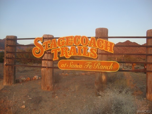 822 South Lone Ranger Road Yucca, AZ 86438 - Photo 3 of 29 a close up of a street sign