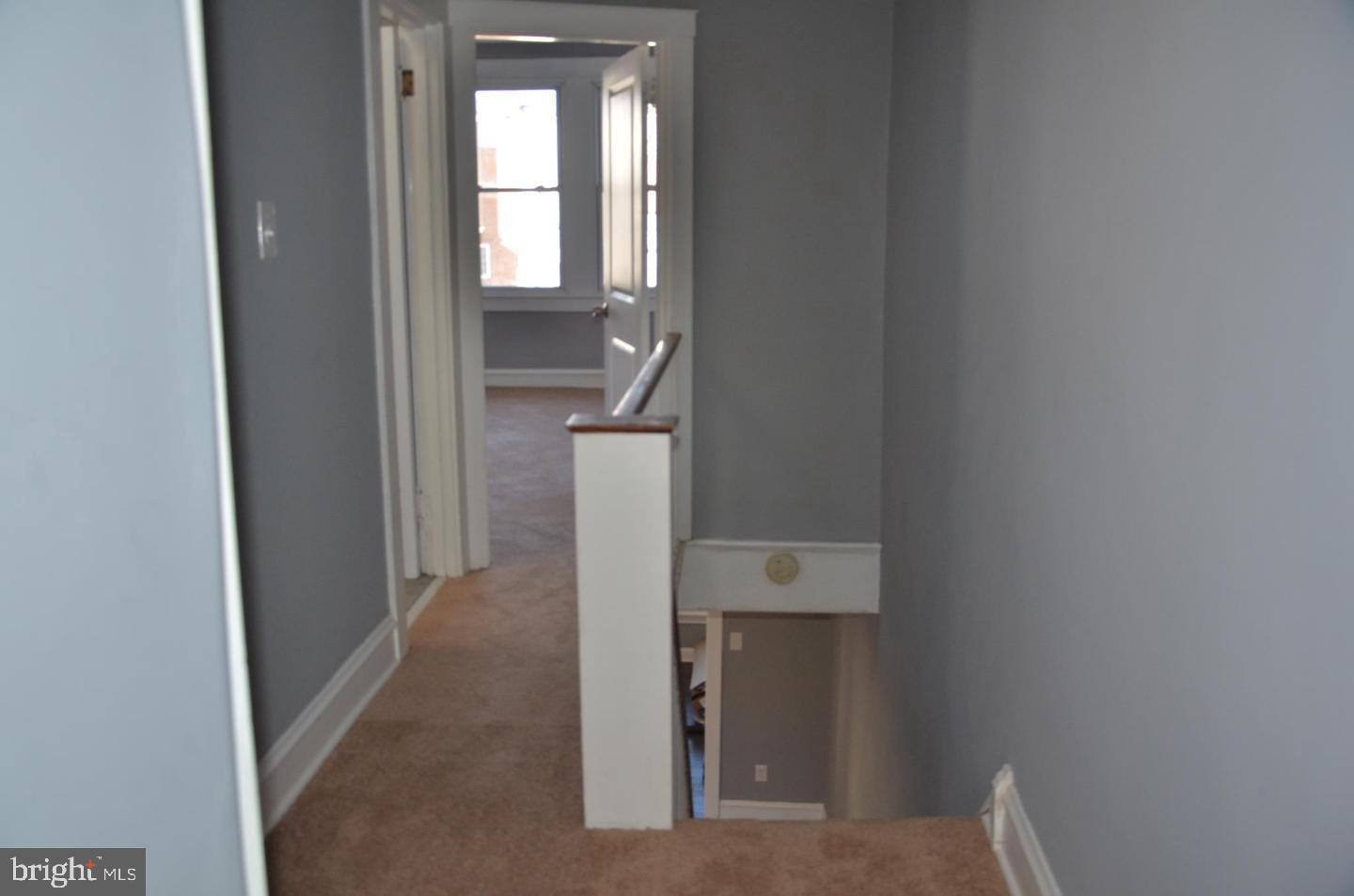 1758 South Avondale Street Philadelphia, PA 19142 - Photo 5 of 10 a view of hallway with window