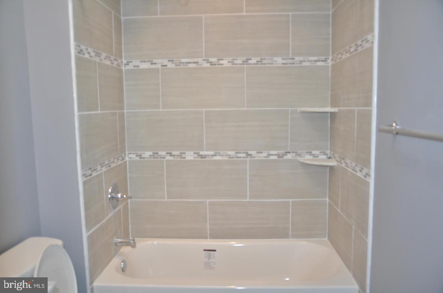 1758 South Avondale Street Philadelphia, PA 19142 - Photo 10 of 10 a close up of a bathtub