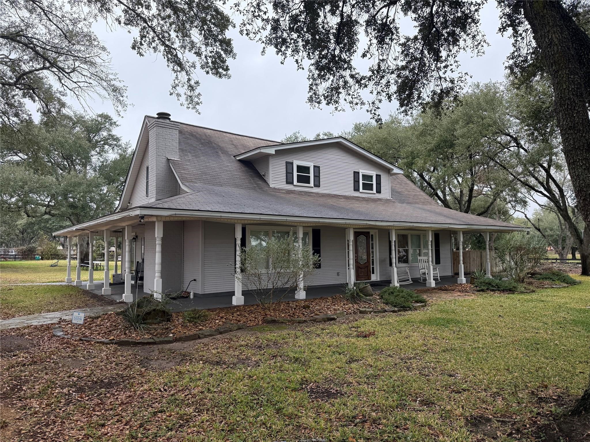 16607 Mueschke Road Cypress, TX 77433 - Photo 2 of 24 a front view of a house with garden