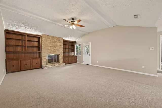 a view of a kitchen with a sink and dishwasher a refrigerator