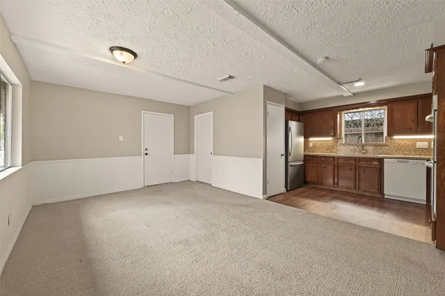 a view of a livingroom with a large window