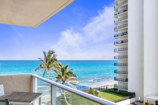 a view of a balcony with an outdoor space