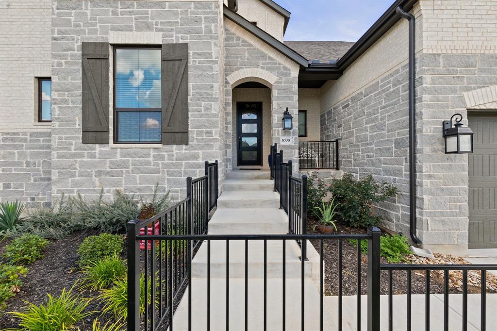 1008 Willie Rnch Way Leander, TX 78641 - Photo 3 of 40 Property entrance featuring stone siding