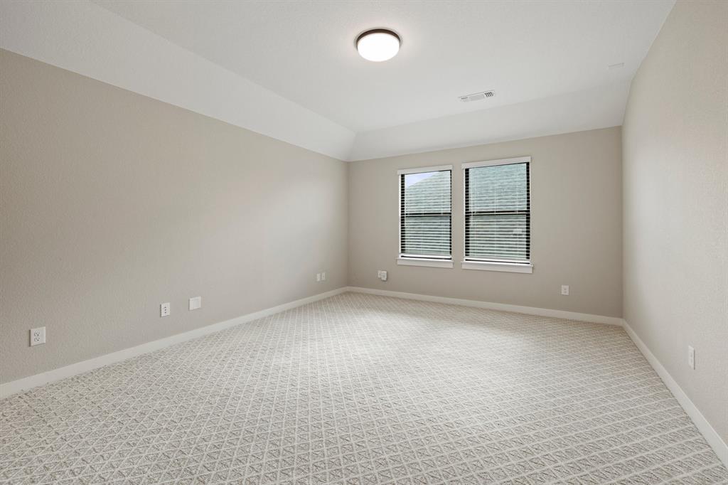 1008 Willie Rnch Way Leander, TX 78641 - Photo 29 of 40 Spare room featuring baseboards and light carpet