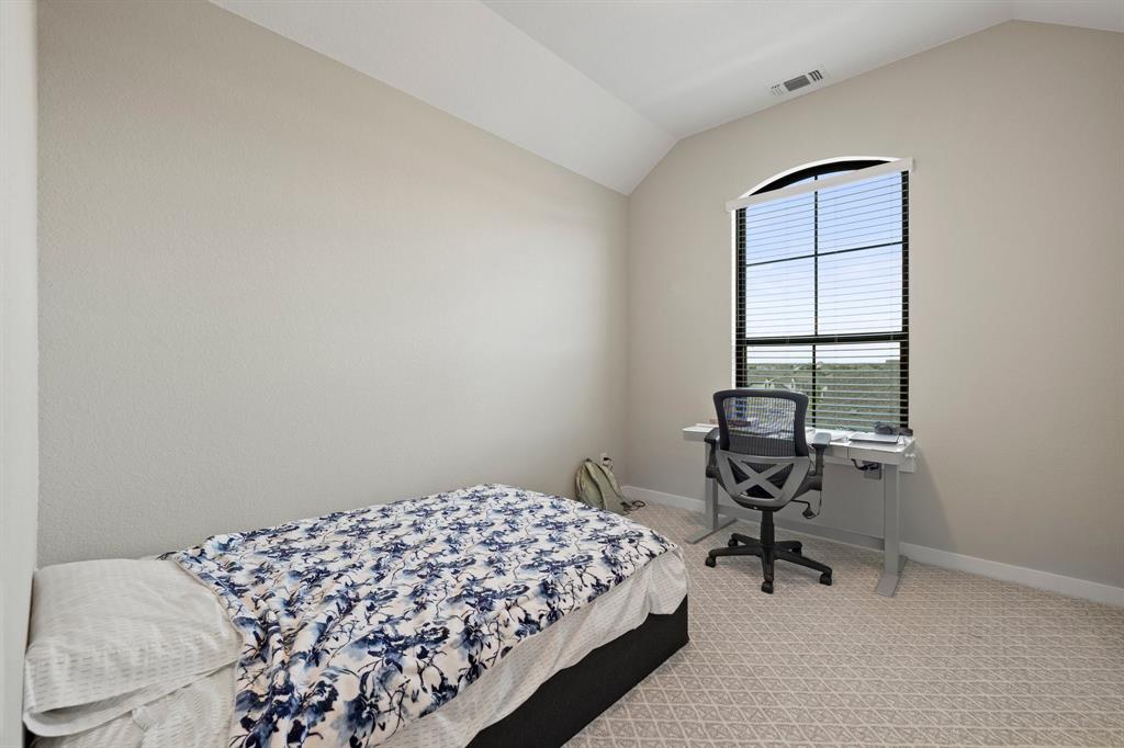 1008 Willie Rnch Way Leander, TX 78641 - Photo 30 of 40 Bedroom with light colored carpet and baseboards