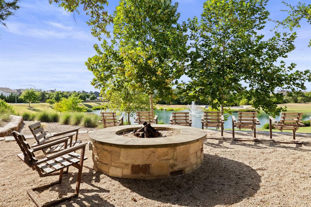 1008 Willie Rnch Way Leander, TX 78641 - Photo 35 of 40 View of community featuring a fire pit and a water view