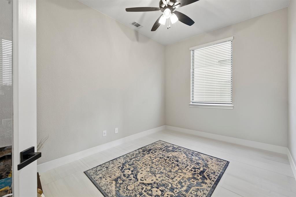 1008 Willie Rnch Way Leander, TX 78641 - Photo 6 of 40 Unfurnished room featuring ceiling fan and baseboards