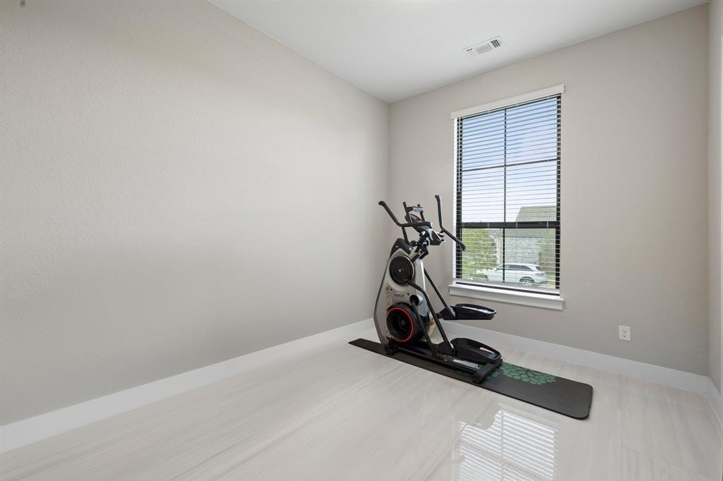 1008 Willie Rnch Way Leander, TX 78641 - Photo 8 of 40 Exercise area featuring baseboards