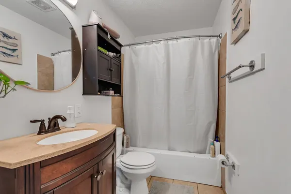 a room with a bed and a window