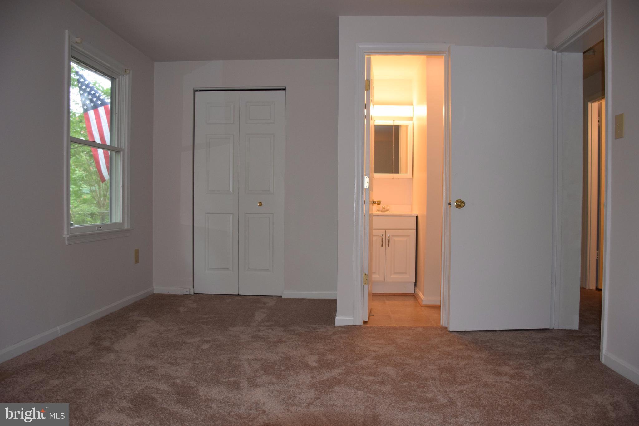 2471 Hallowing Point Road Prince Frederick, MD 20678 - Photo 17 of 30 an empty room with windows