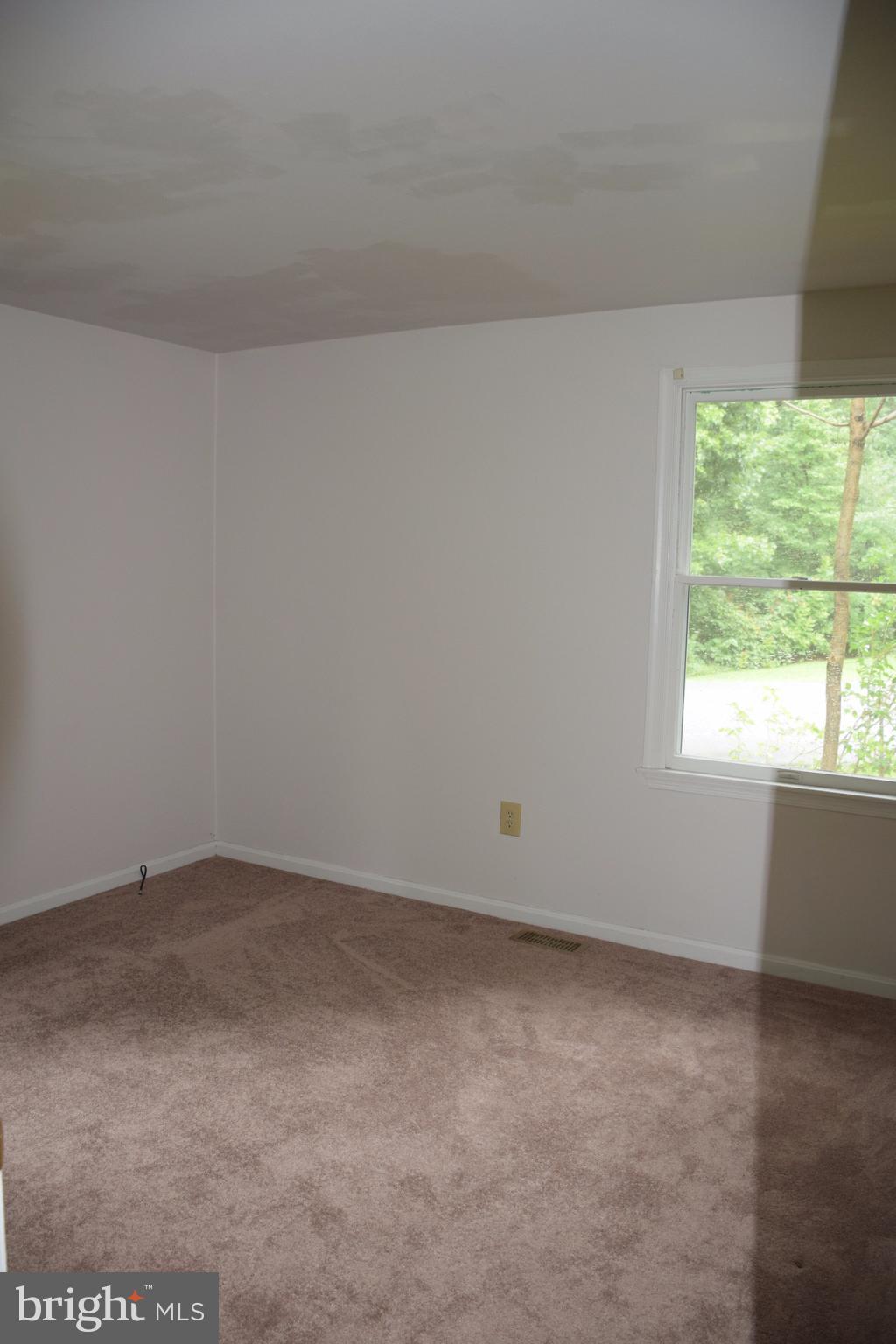 2471 Hallowing Point Road Prince Frederick, MD 20678 - Photo 21 of 30 an empty room with a window