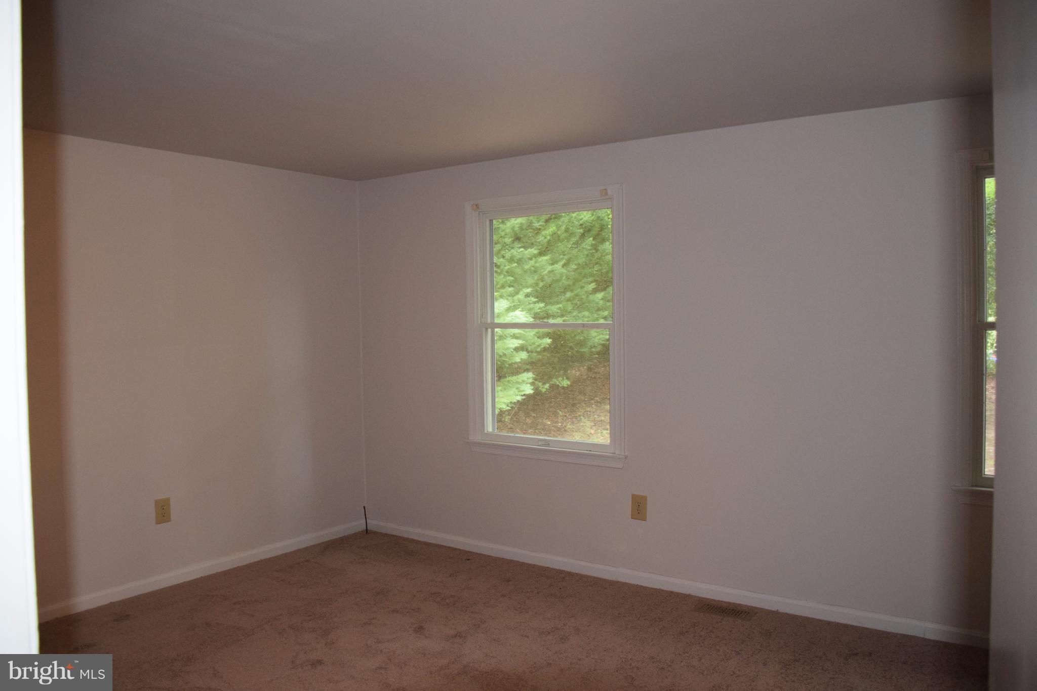 2471 Hallowing Point Road Prince Frederick, MD 20678 - Photo 22 of 30 an empty room with a window