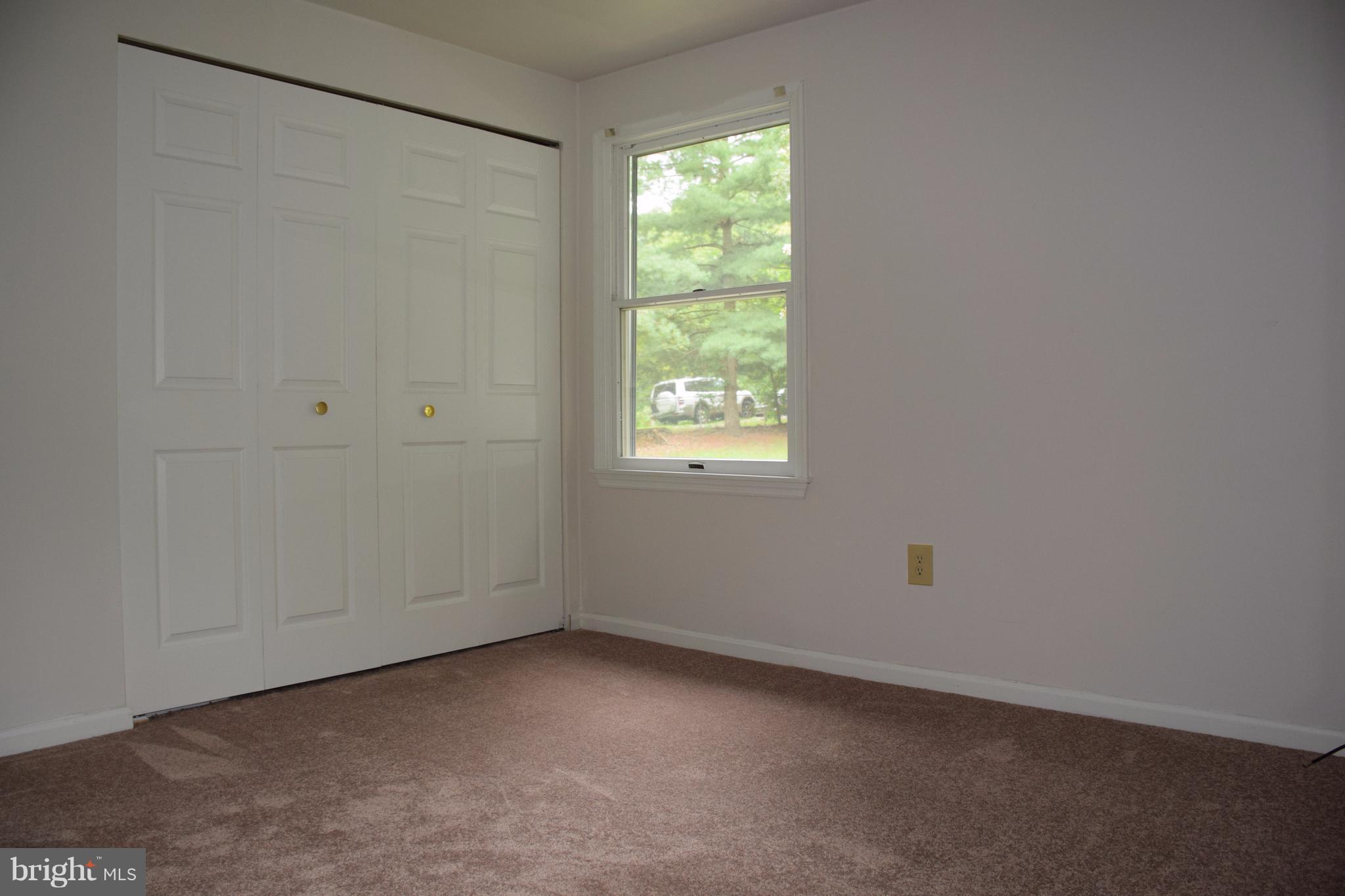 2471 Hallowing Point Road Prince Frederick, MD 20678 - Photo 23 of 30 a view of an empty room with a window