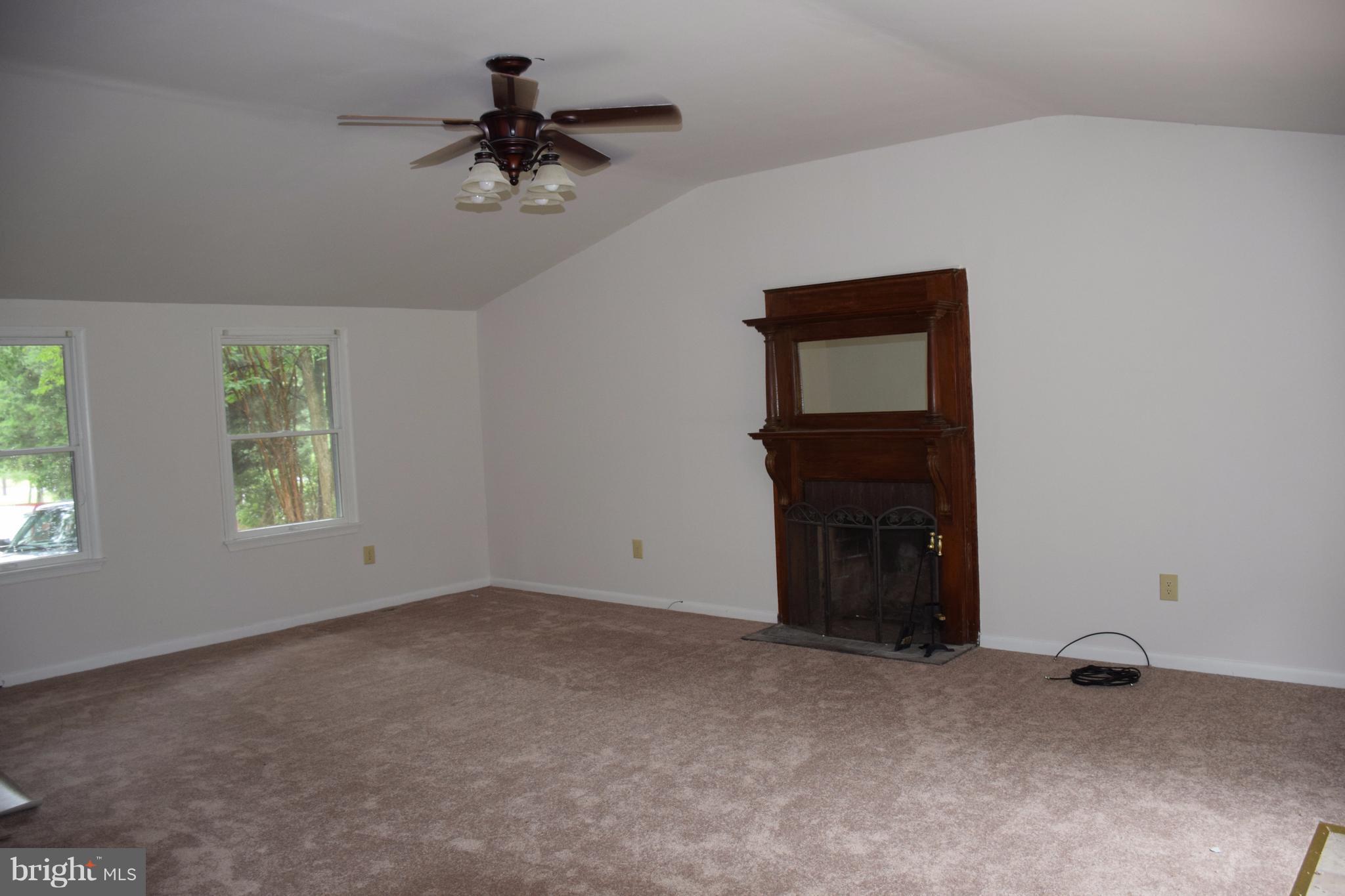 2471 Hallowing Point Road Prince Frederick, MD 20678 - Photo 6 of 30 a view of an empty room with a window