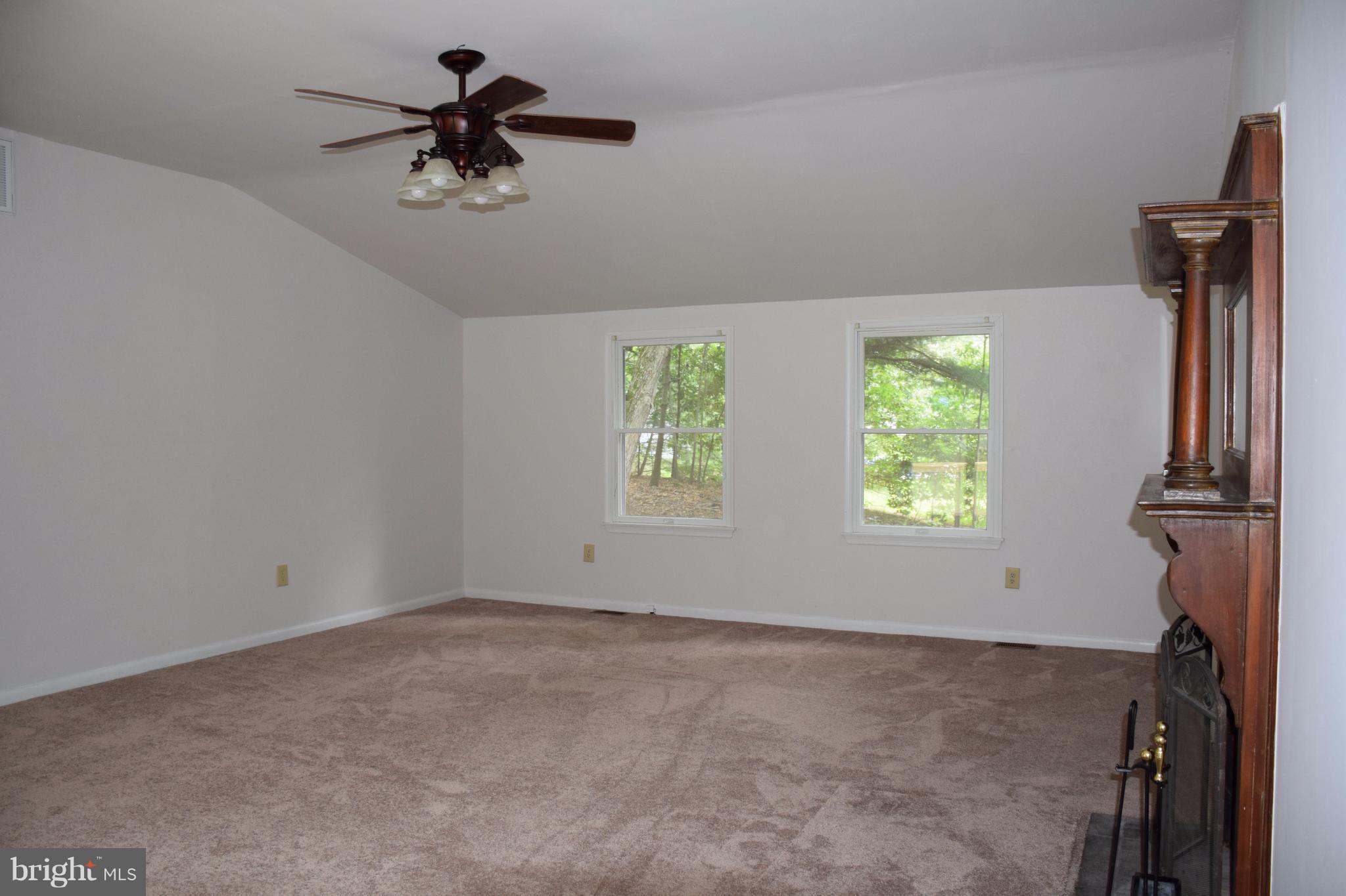 2471 Hallowing Point Road Prince Frederick, MD 20678 - Photo 8 of 30 a view of room with a ceiling fan and window