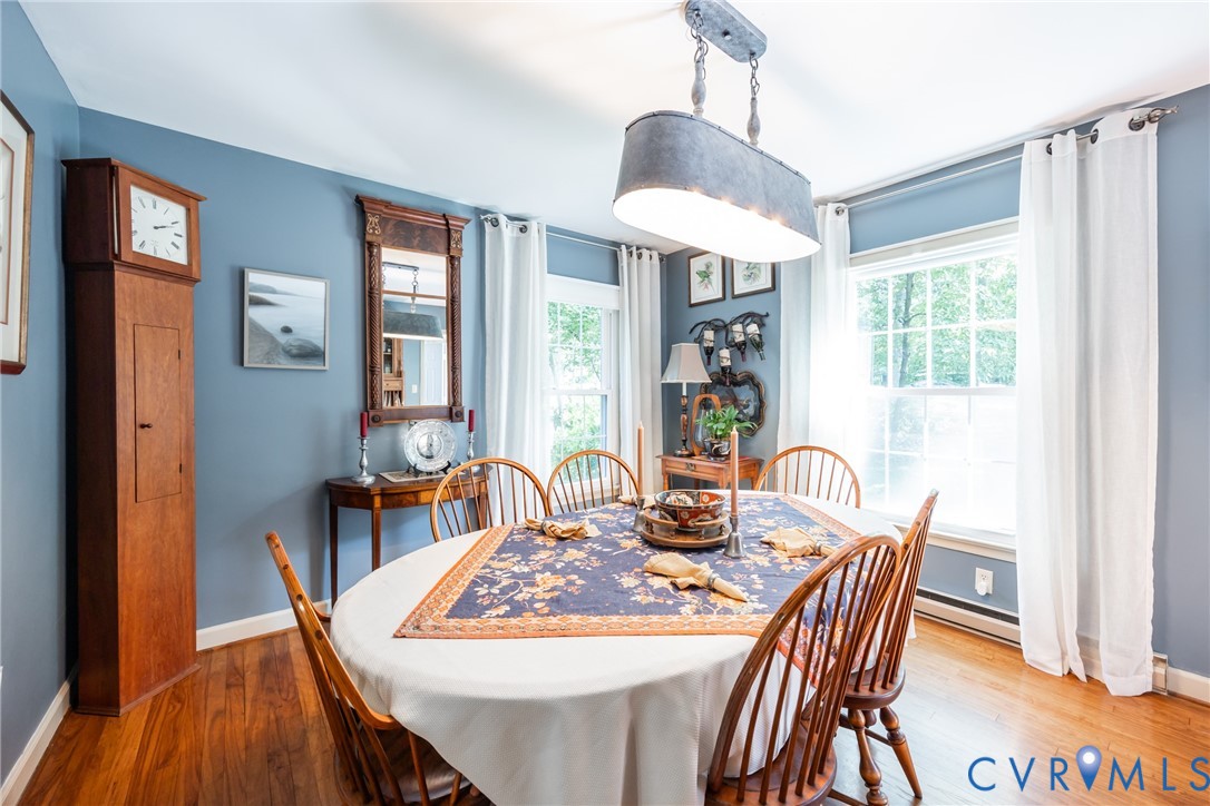 11766 Five Forks Road Farmville, VA 23901 - Photo 13 of 50 a dining room with furniture a chandelier and wooden floor