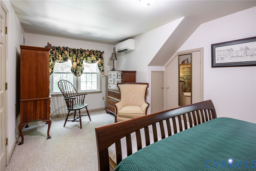 11766 Five Forks Road Farmville, VA 23901 - Photo 22 of 50 a bedroom with furniture and a window