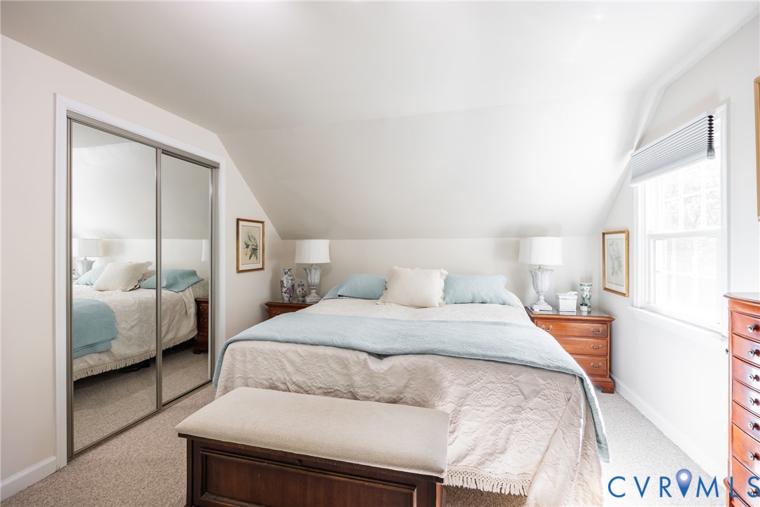 11766 Five Forks Road Farmville, VA 23901 - Photo 27 of 50 a bedroom with a bed and a couch