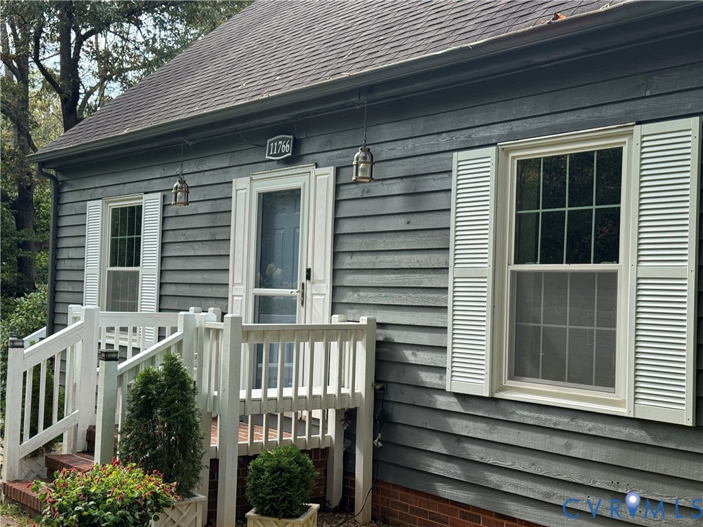11766 Five Forks Road Farmville, VA 23901 - Photo 3 of 50 a front view of a house with a porch