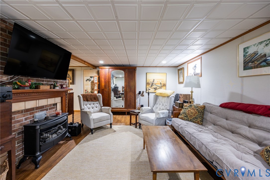 11766 Five Forks Road Farmville, VA 23901 - Photo 31 of 50 Basement Great Room with wood finished floors, an