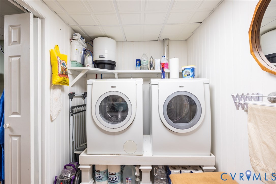 11766 Five Forks Road Farmville, VA 23901 - Photo 38 of 50 a view of a storage & utility room with washer and dryer