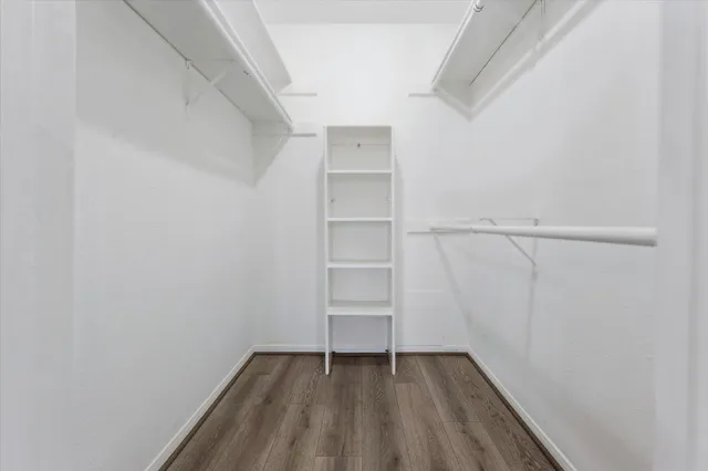 a view of an empty walk in closet