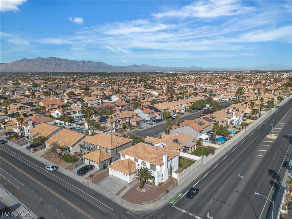 3604 North Campbell Road Las Vegas, NV 89129 - Photo 3 of 54 Aerial view of residential area with a mountainous background