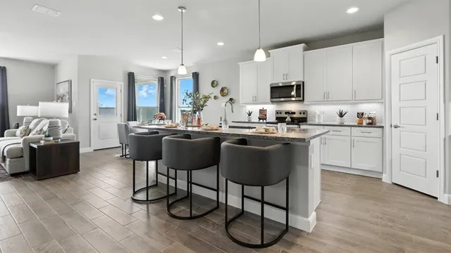 a front view of a house with yard