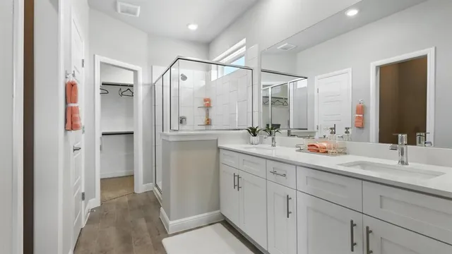 a bedroom with a bed and a lamp