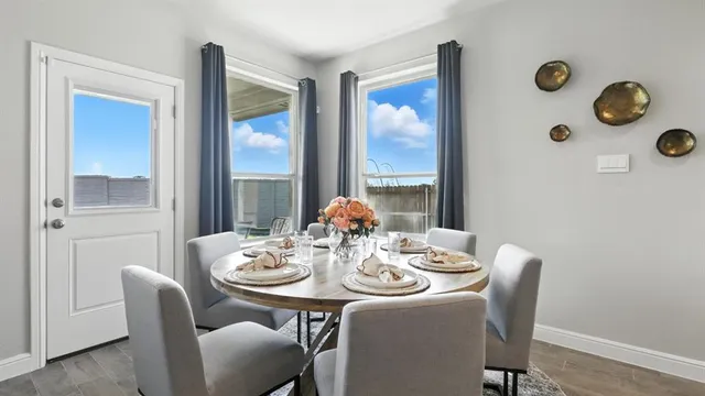 a kitchen with granite countertop a sink and cabinets